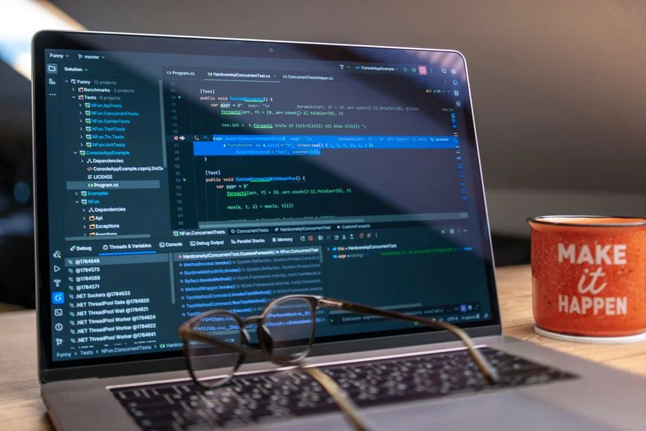 A contemporary workspace showcasing a laptop, tablet, and smartphones, ideal for tech and freelance use.